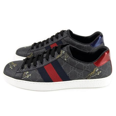 gucci tiger sneakers black.